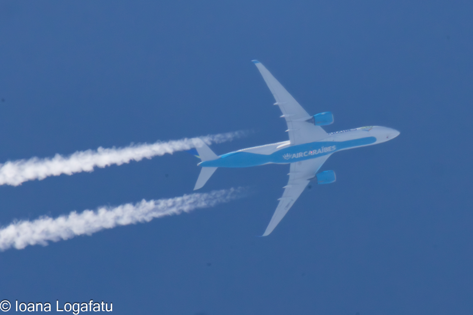 Cloud trails in a blue sky journey